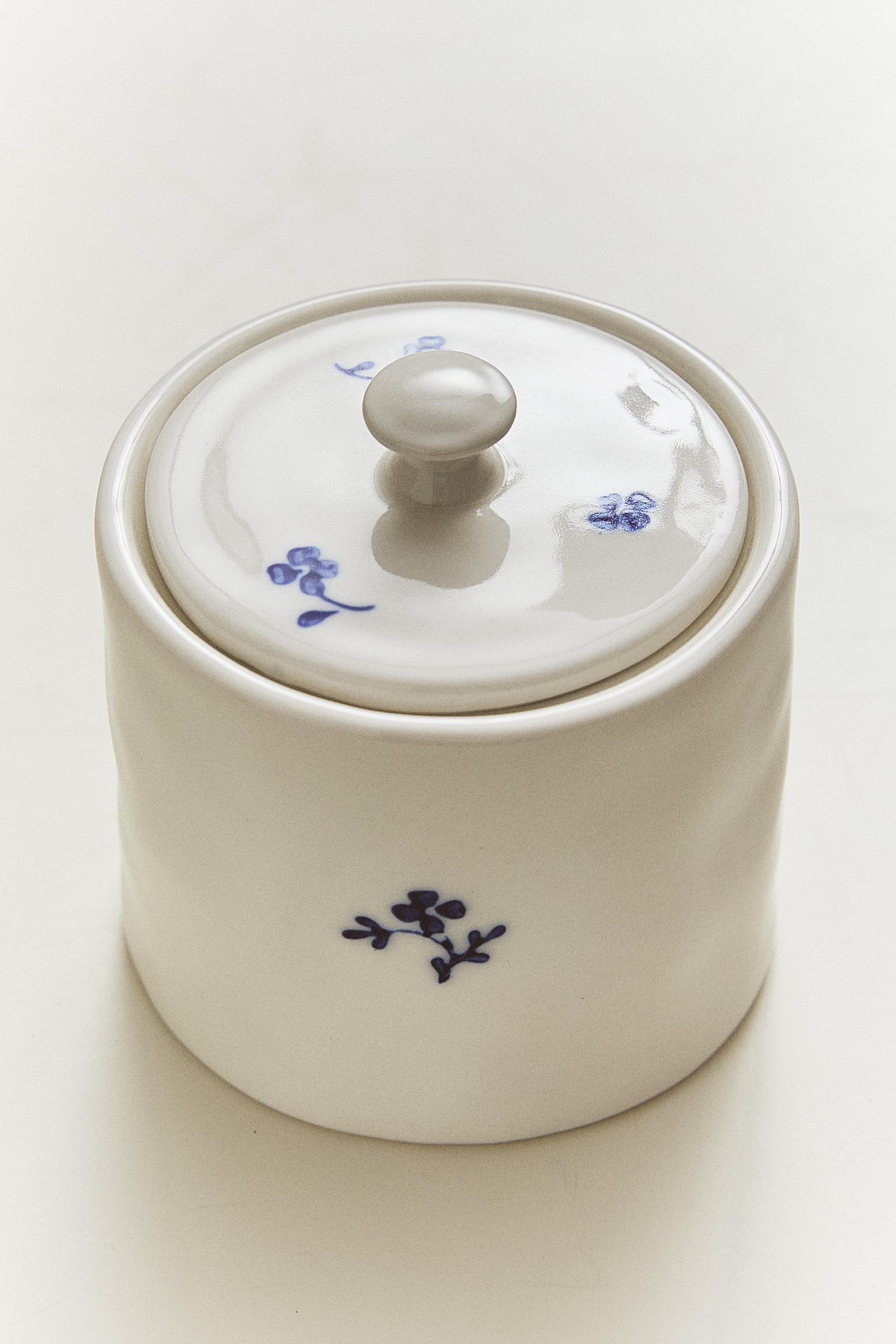PORCELAIN SUGAR BOWL WITH FLORAL DETAIL